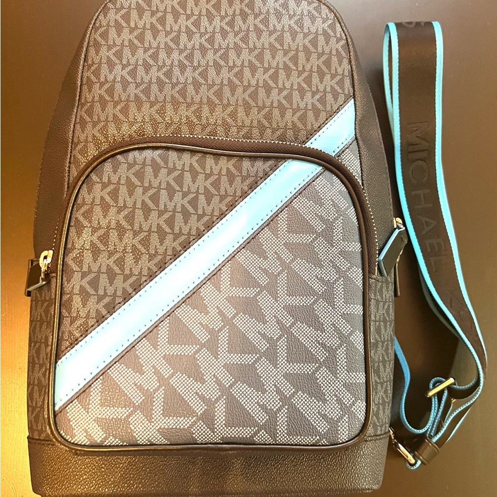 Original, New Michael Kors sling backpack for women and men.